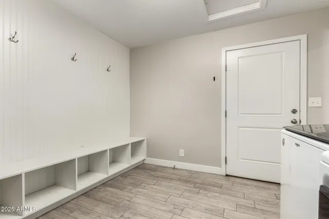 a view of a chairs and table in the patio