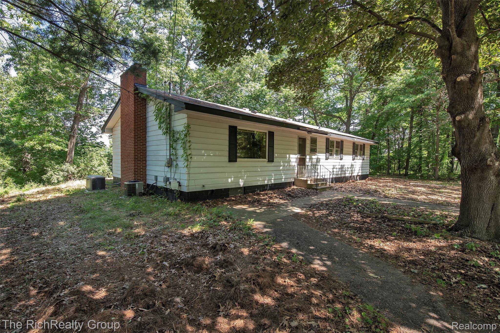 8822 River Valley Road Brighton, MI 48116 - Photo 2 of 44 8822-River-Valley-Rd-Brighton-MI-48116-windowstill-2.jpg