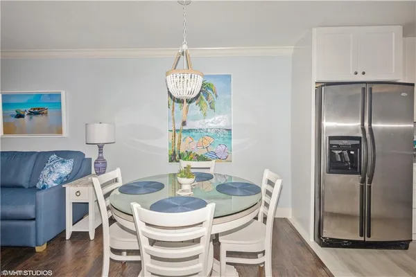 a view of a dining room with furniture