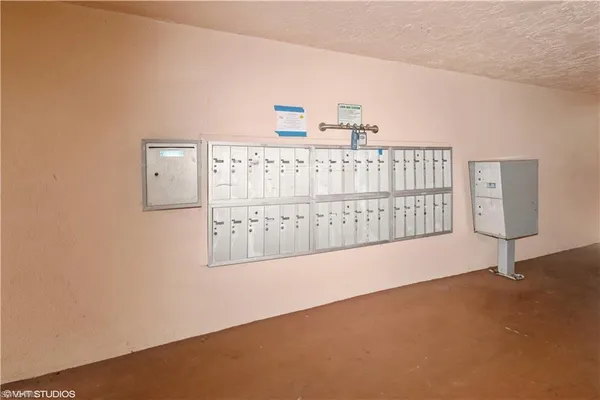 a view of a hallway with staircase