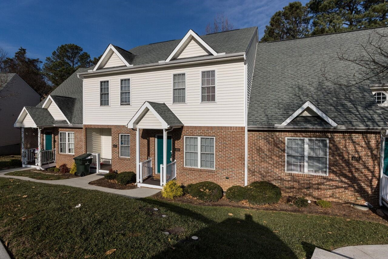 4802 Parkville Drive Raleigh, NC 27604 - Photo 2 of 15 a view of house with yard in front of it