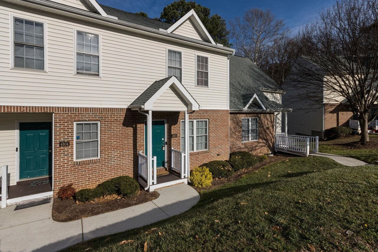 4802 Parkville Drive Raleigh, NC 27604 - Photo 3 of 15 a front view of a house with a yard