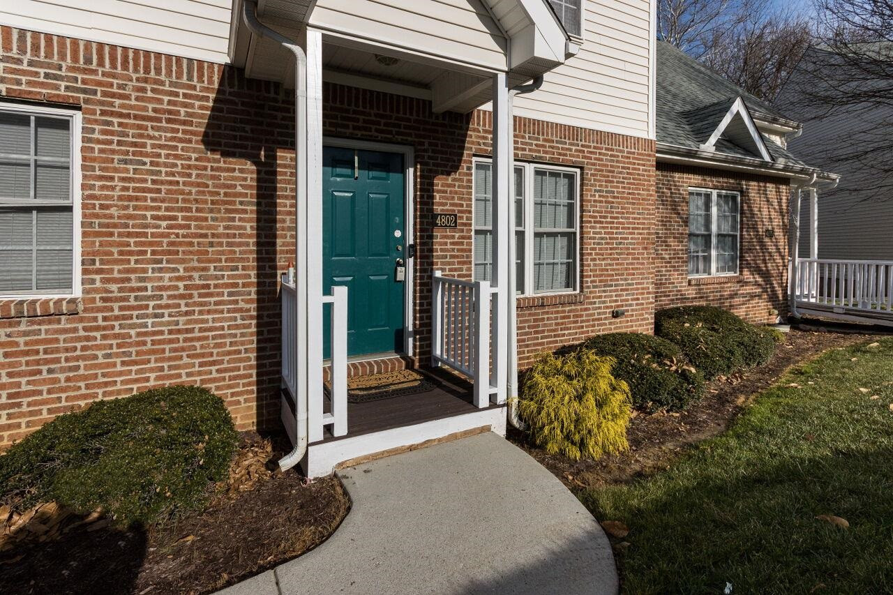 4802 Parkville Drive Raleigh, NC 27604 - Photo 4 of 15 a view of a house with a small garden