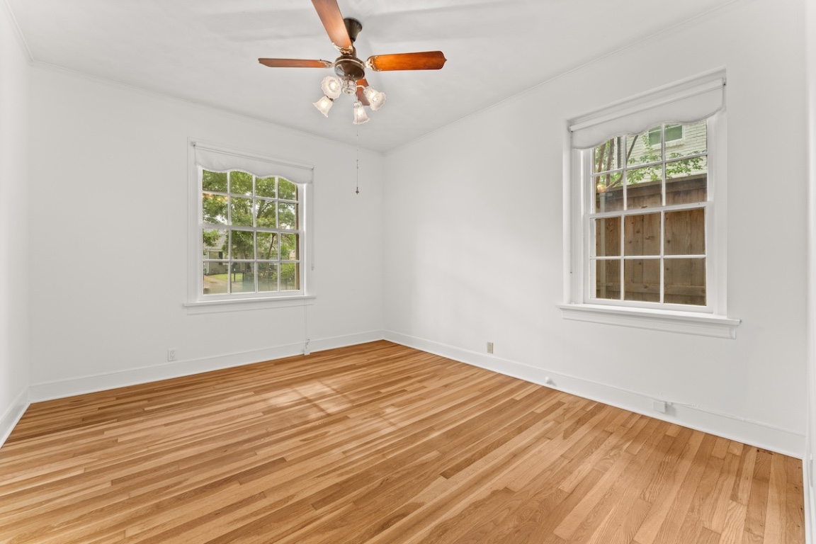 2534 Harris Boulevard Austin, TX 78703 - Photo 13 of 26 an empty room with window and ceiling fan