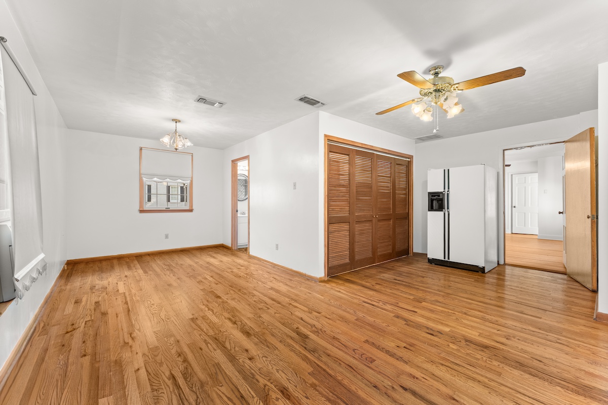 2534 Harris Boulevard Austin, TX 78703 - Photo 22 of 26 a view of empty room with wooden floor and ceiling fan