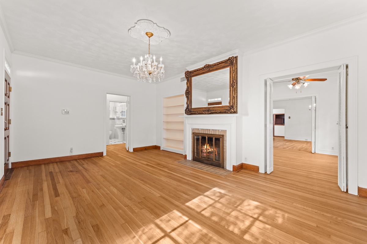2534 Harris Boulevard Austin, TX 78703 - Photo 4 of 26 a view of a livingroom with wooden floor and a fireplace