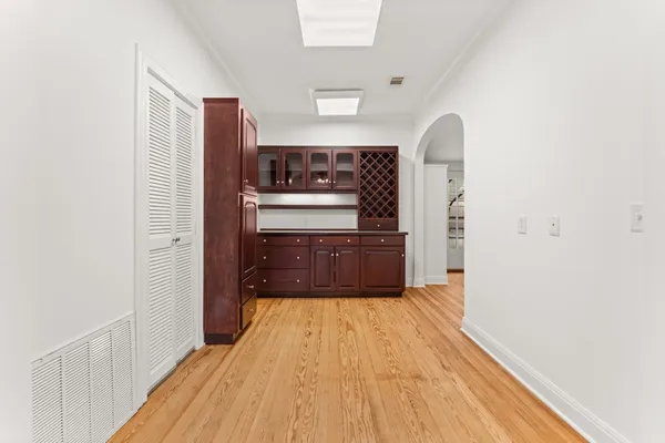a kitchen with stainless steel appliances a refrigerator and a stove top oven