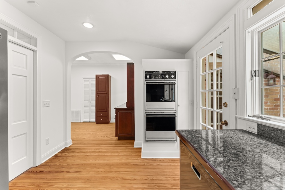 2534 Harris Boulevard Austin, TX 78703 - Photo 8 of 26 a kitchen with stainless steel appliances granite countertop a refrigerator and a sink