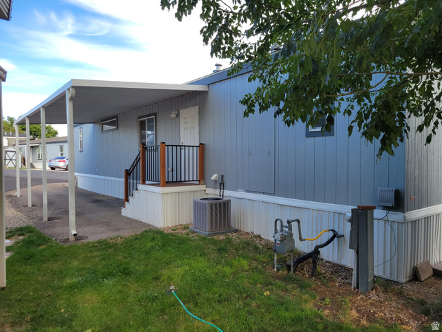 156 Cushing Way Layton, UT 84041 - Photo 4 of 20 Covered patio with supporting columns