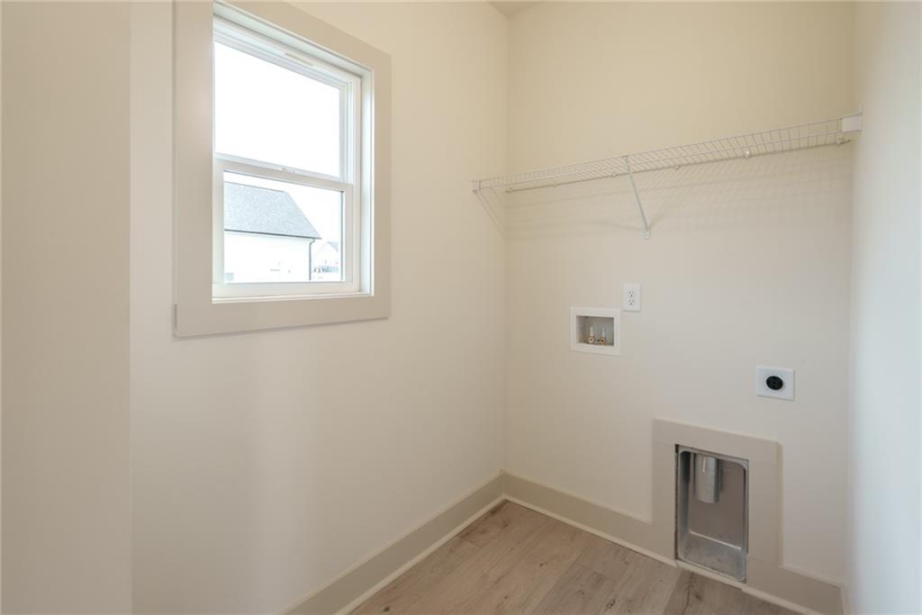 205 Squirrel Run Good Hope, GA 30641 - Photo 14 of 50 an empty room with a window