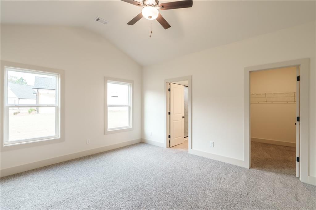 205 Squirrel Run Good Hope, GA 30641 - Photo 17 of 50 a view of an empty room with a window