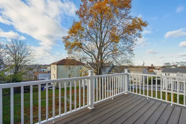 a view of a wooden roof deck