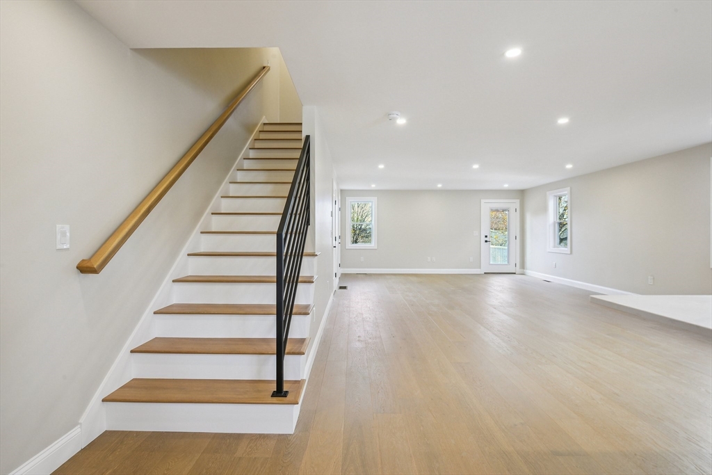 120 Stowe Street, Unit 120 Fall River, MA 02720 - Photo 6 of 21 a view of room with stairs and wooden floor