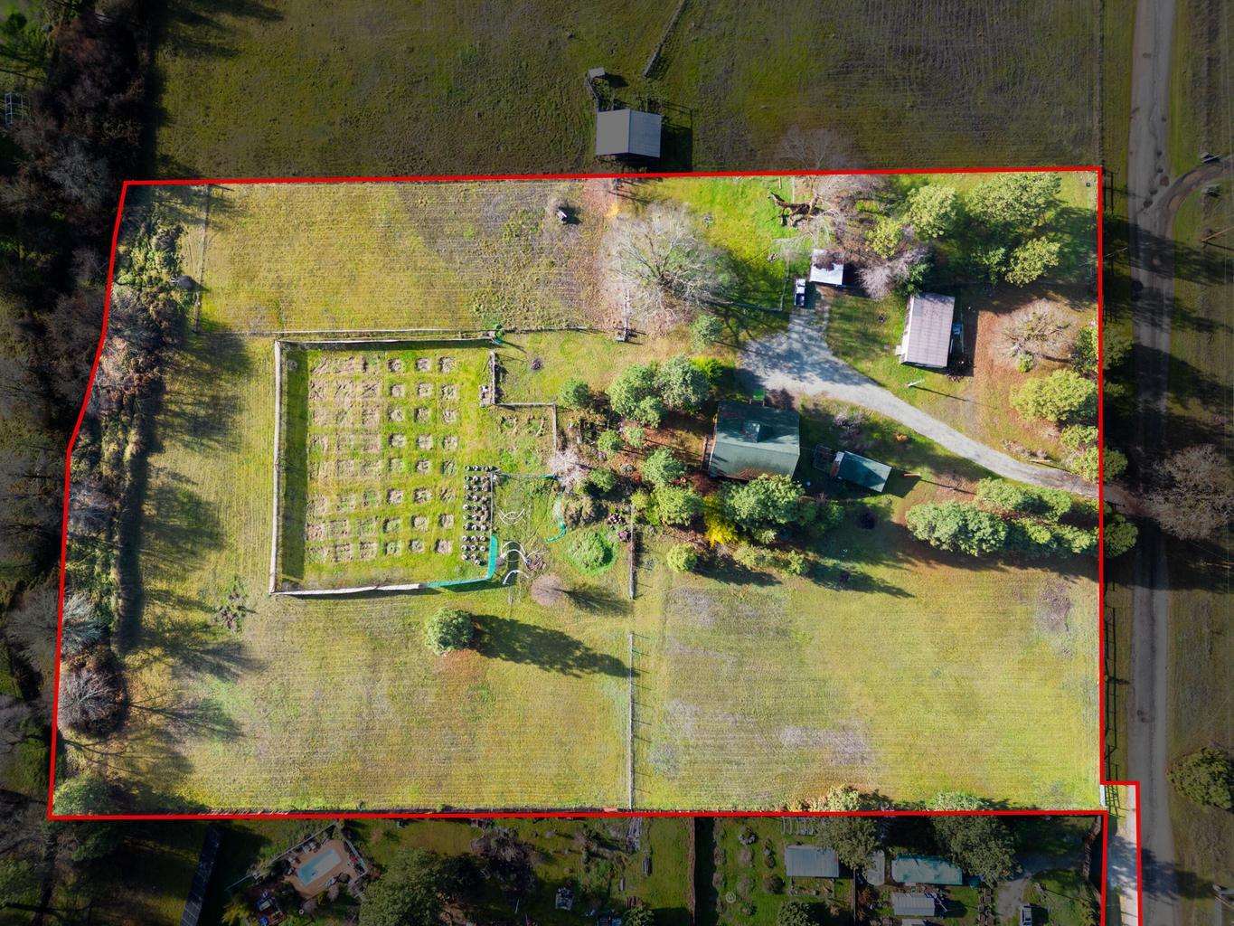 1190 Cedar Flat Road Williams, OR 97544 - Photo 33 of 45 an aerial view of residential houses with outdoor space