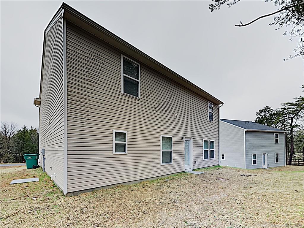 621 Buckskin Road Oakboro, NC 28129 - Photo 15 of 15 a house with a garage