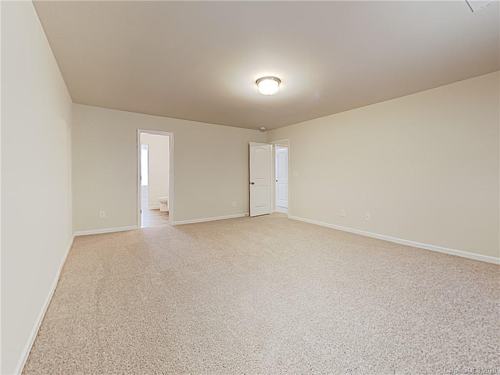 621 Buckskin Road Oakboro, NC 28129 - Photo 8 of 15 a view of an empty room