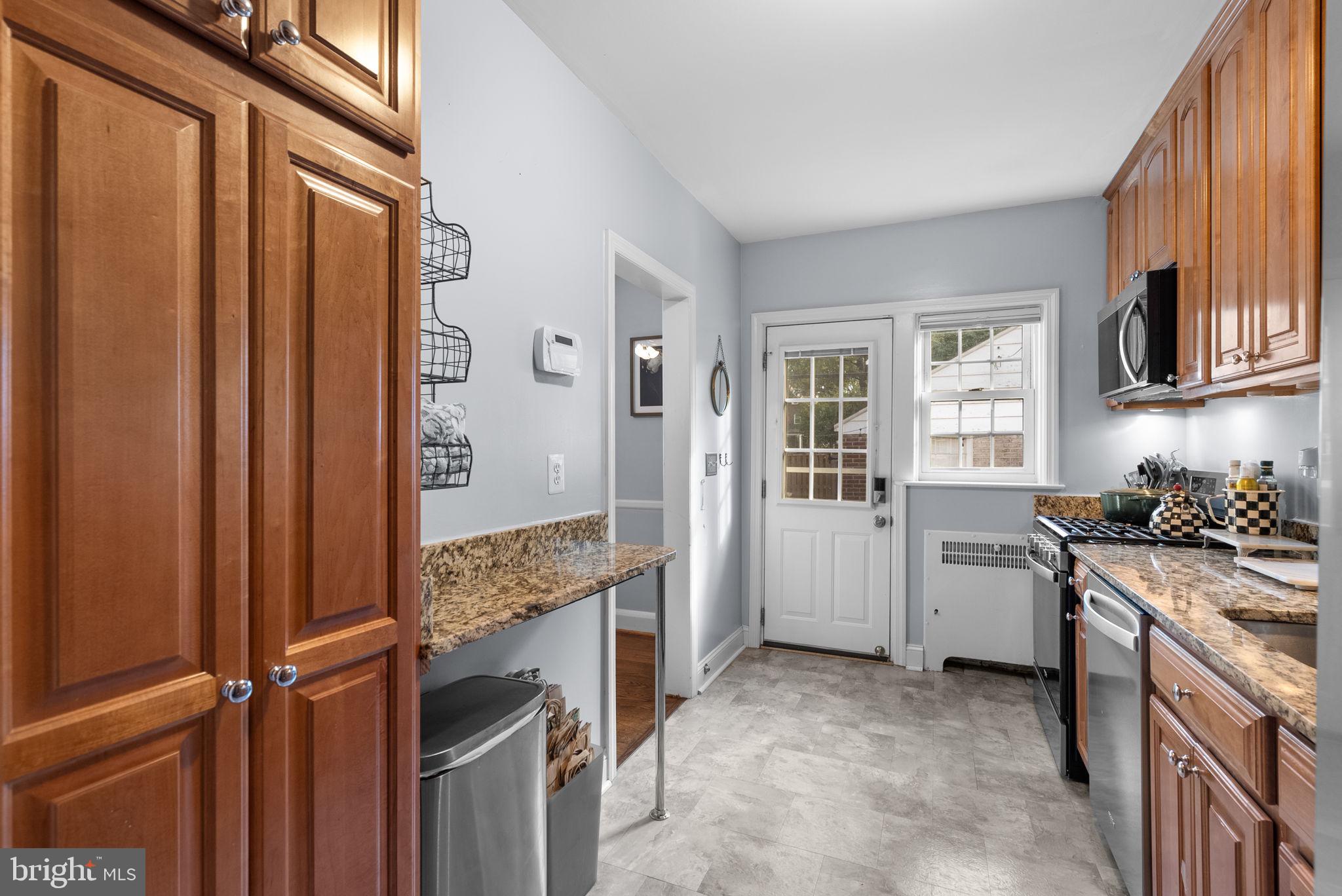 229 Murdock Road Baltimore, MD 21212 - Photo 18 of 39 Main level; kitchen w/ rear exit.