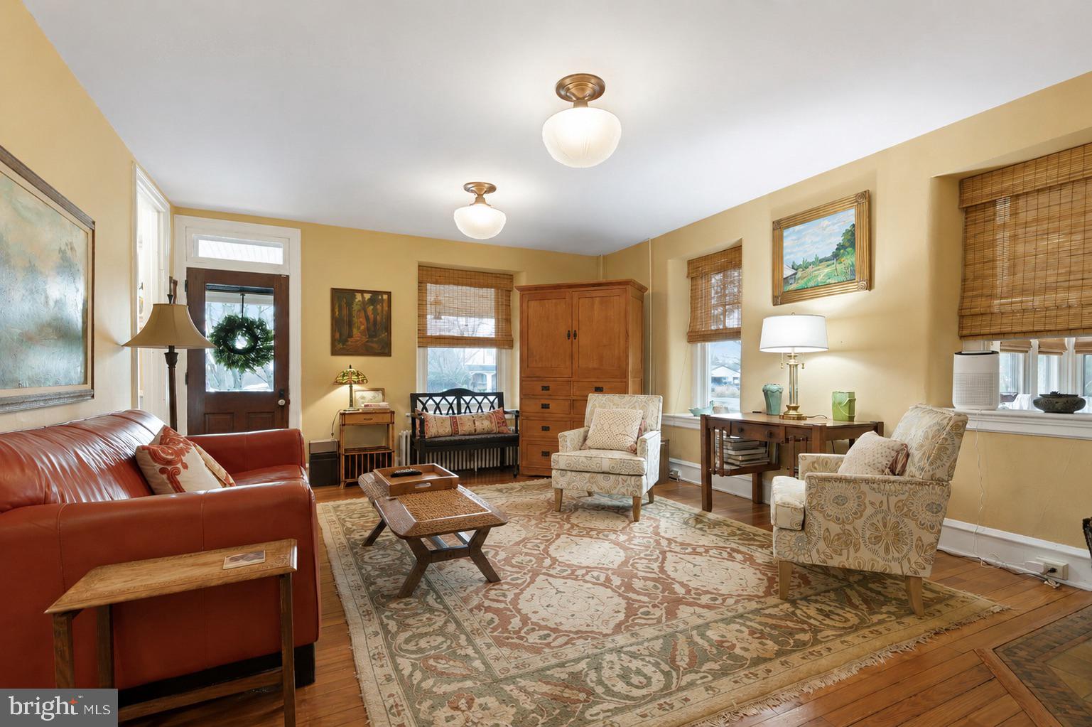 75 Morris Road Harleysville, PA 19438 - Photo 4 of 68 a living room with furniture and wooden floor