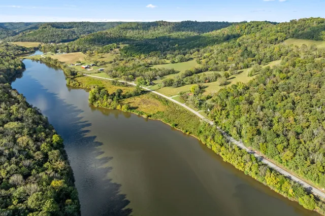 a picture of a park with a bench