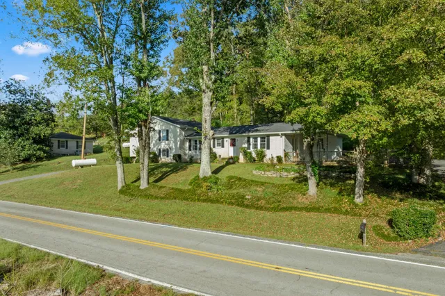 a view of a house with a swimming pool
