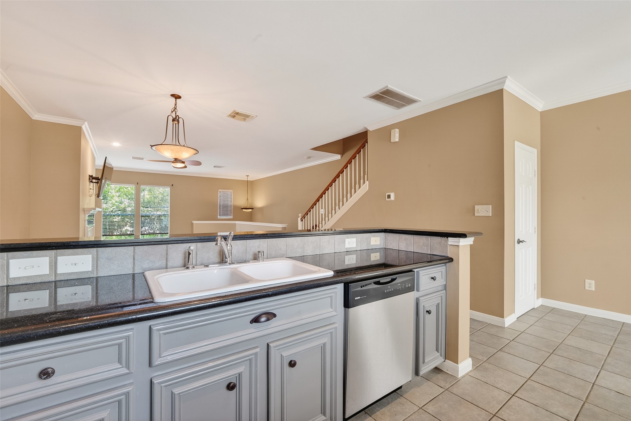 2804 Chenevert Street Houston, TX 77004 - Photo 16 of 37 a kitchen with a stove and a white cabinets