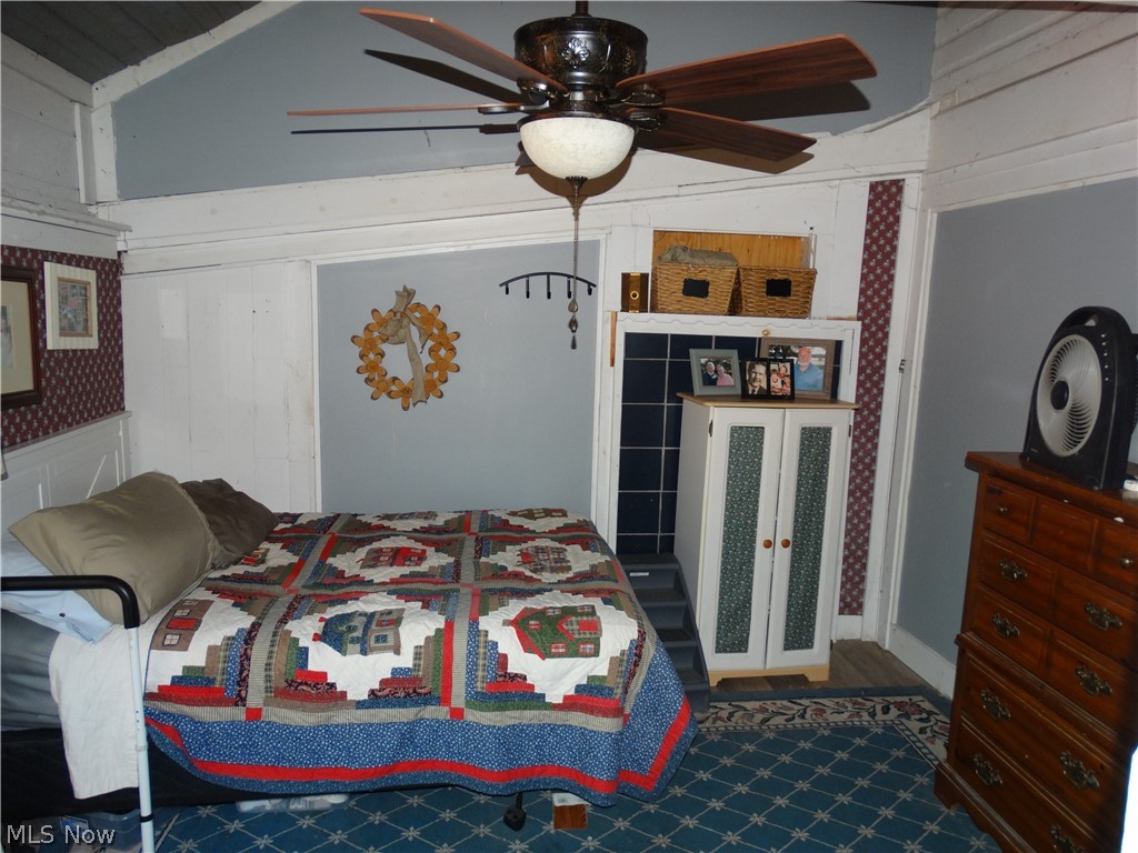 7759 North Ridge Road Madison, OH 44057 - Photo 6 of 14 Bedroom featuring ceiling fan and lofted ceiling