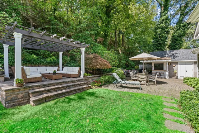 a view of a chair and table of the garden