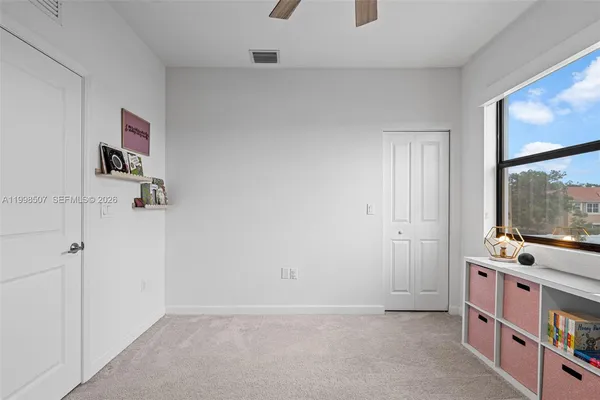 an empty room with windows