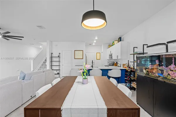 a view of a living room and dining room