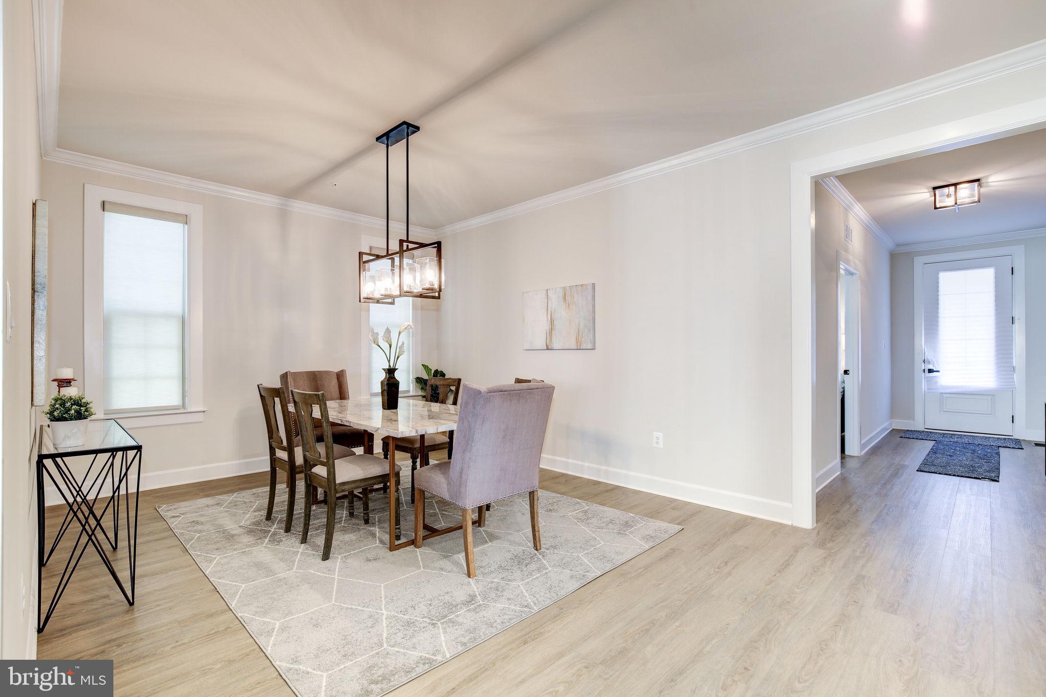 6547 Clubhouse Boulevard Laurel, MD 20708 - Photo 13 of 86 Formal Dining with Elegant light fixture