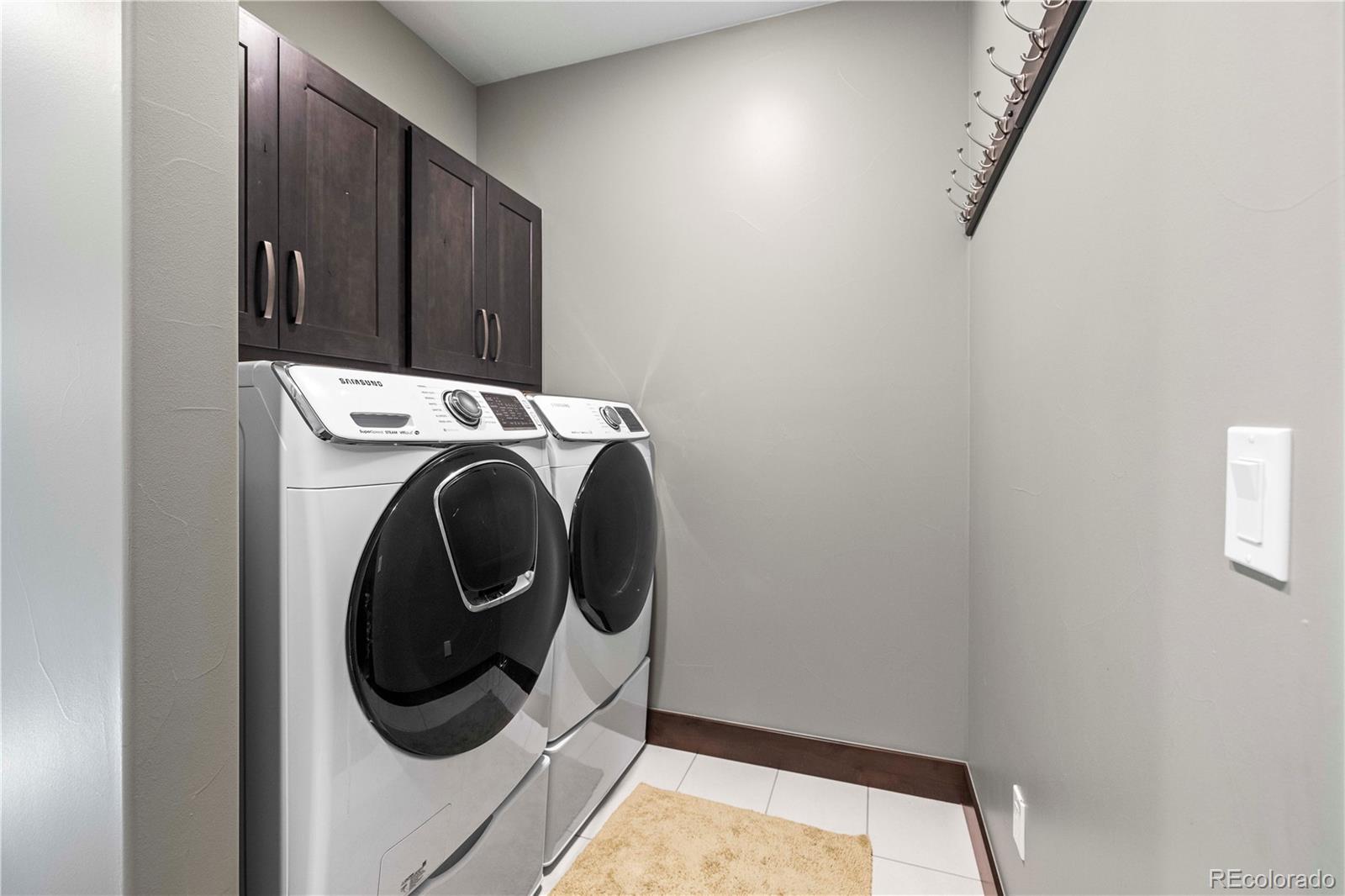 143 Beasley Road Silverthorne, CO 80498 - Photo 14 of 40 a utility room with dryer and washer
