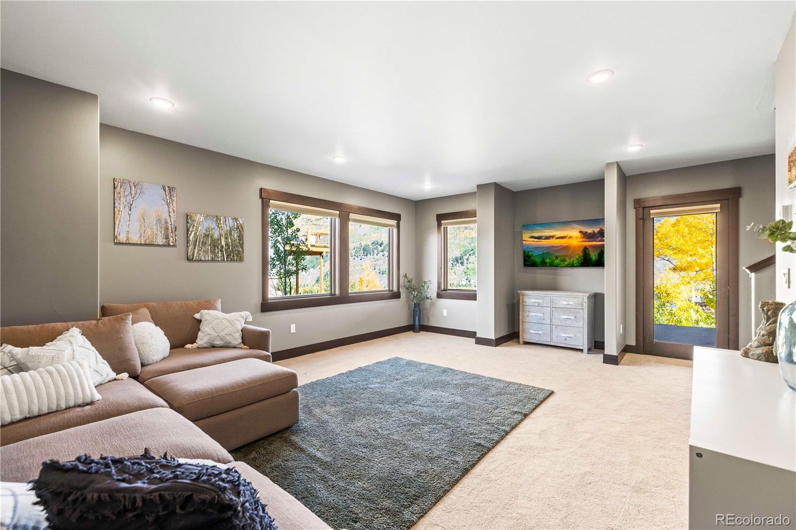 143 Beasley Road Silverthorne, CO 80498 - Photo 19 of 40 a living room with furniture and window