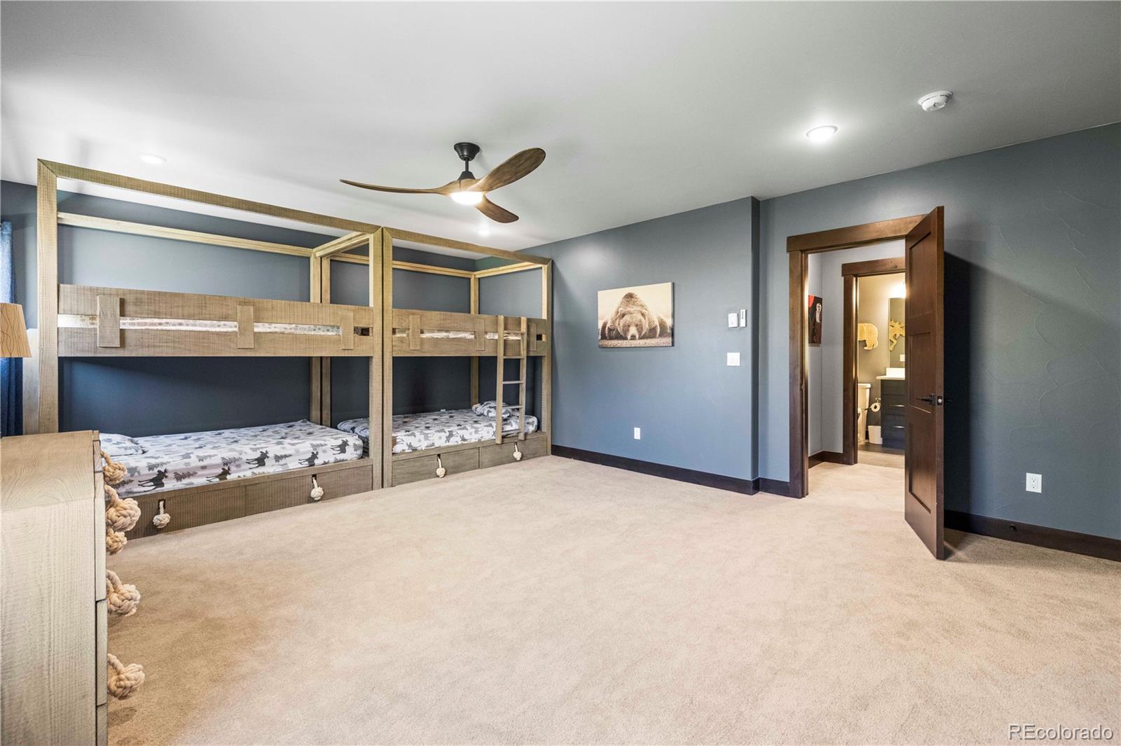 143 Beasley Road Silverthorne, CO 80498 - Photo 21 of 40 a view of a livingroom with a staircase