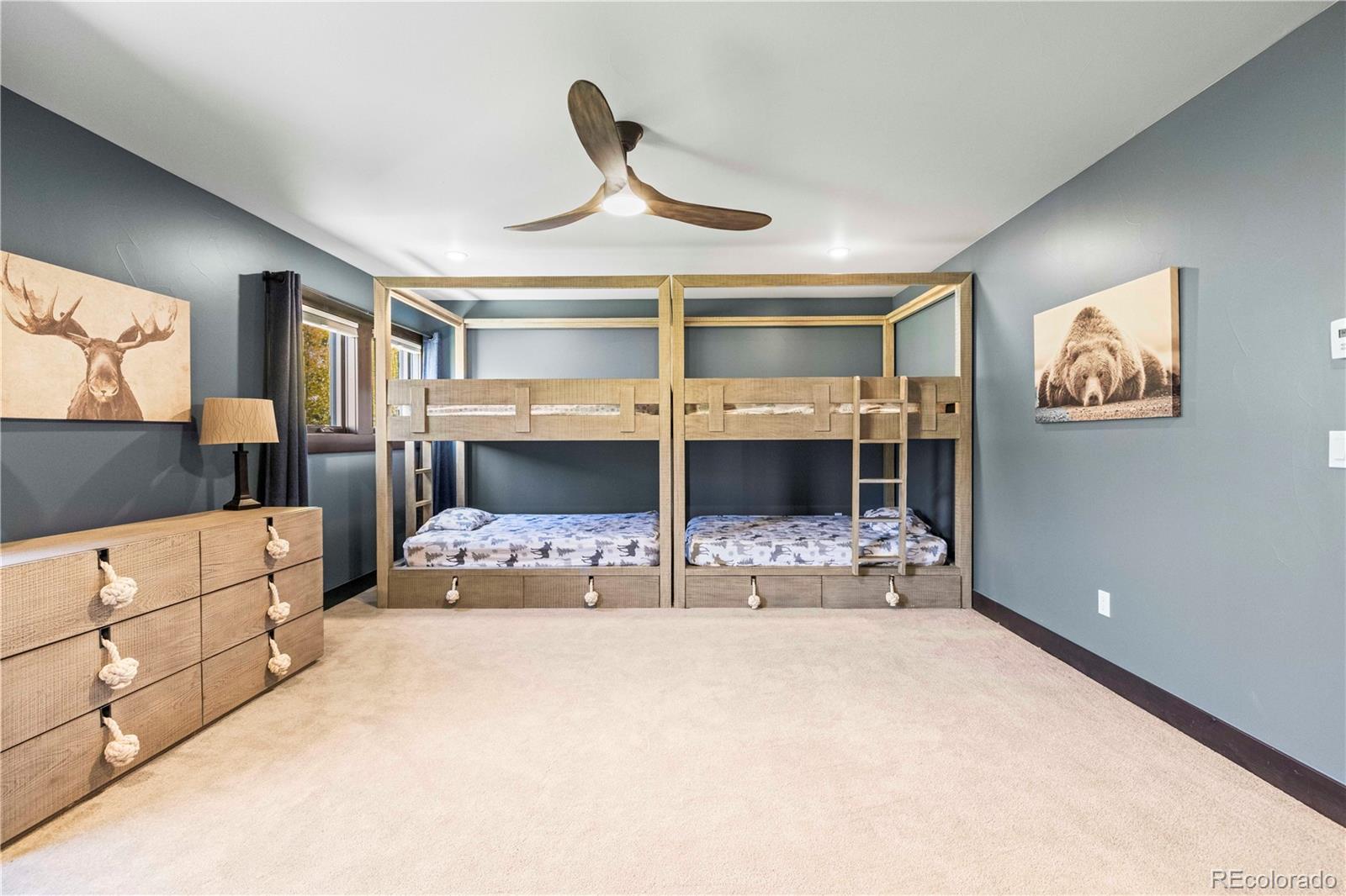 143 Beasley Road Silverthorne, CO 80498 - Photo 22 of 40 a bedroom with bed and window