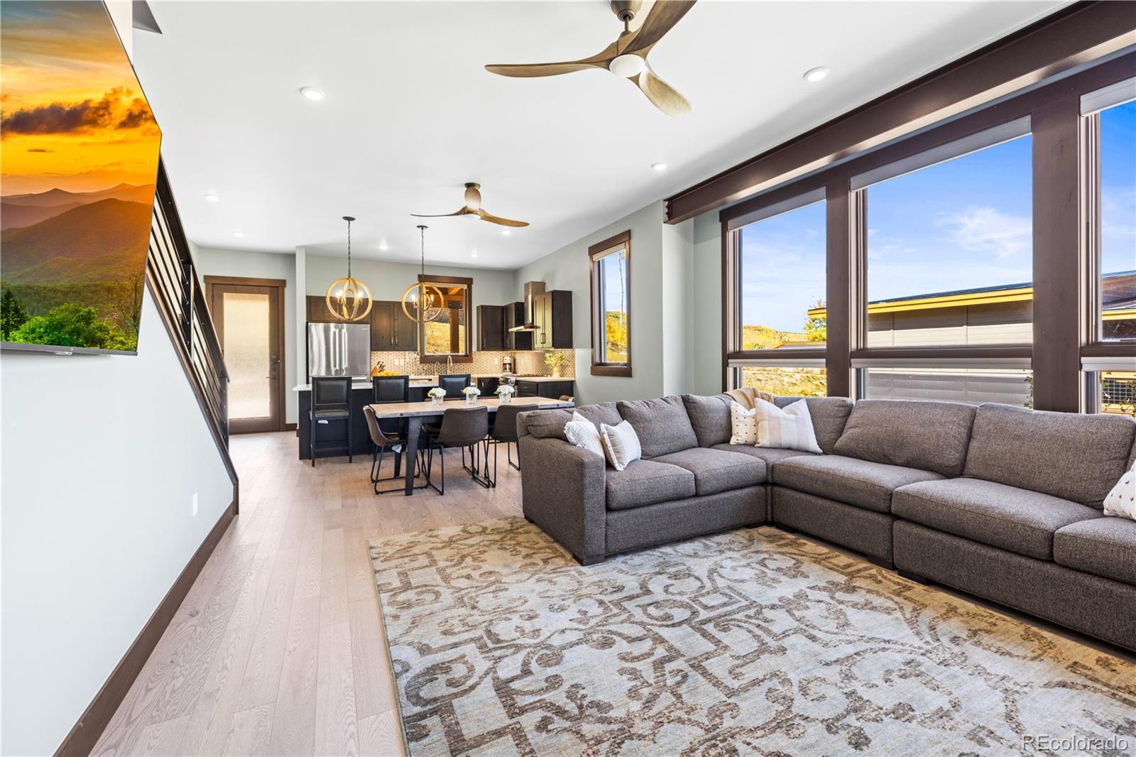143 Beasley Road Silverthorne, CO 80498 - Photo 7 of 40 a living room with furniture and a large window