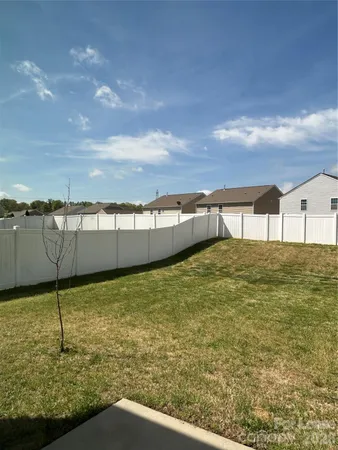 a view of a swimming pool and an outdoor seating