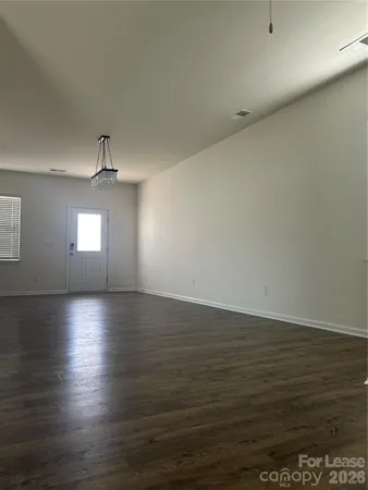 a kitchen with stainless steel appliances wooden cabinets and granite counter tops