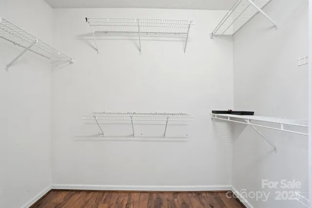 a view of a room with racks on the wall
