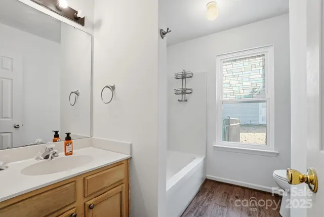 a bathroom with a sink and a bathtub
