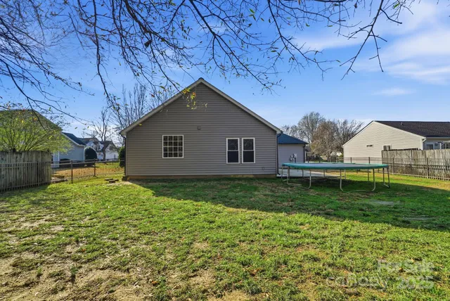 a view of a backyard of house