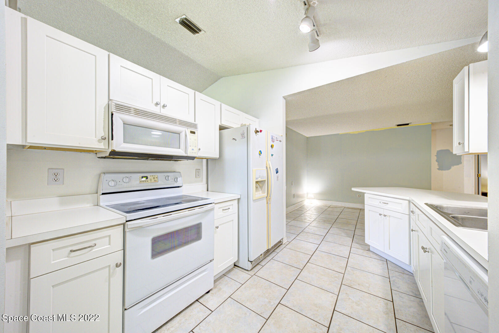 6457 Hunt Road Cocoa, FL 32927 - Photo 17 of 36 kitchen with tile floor