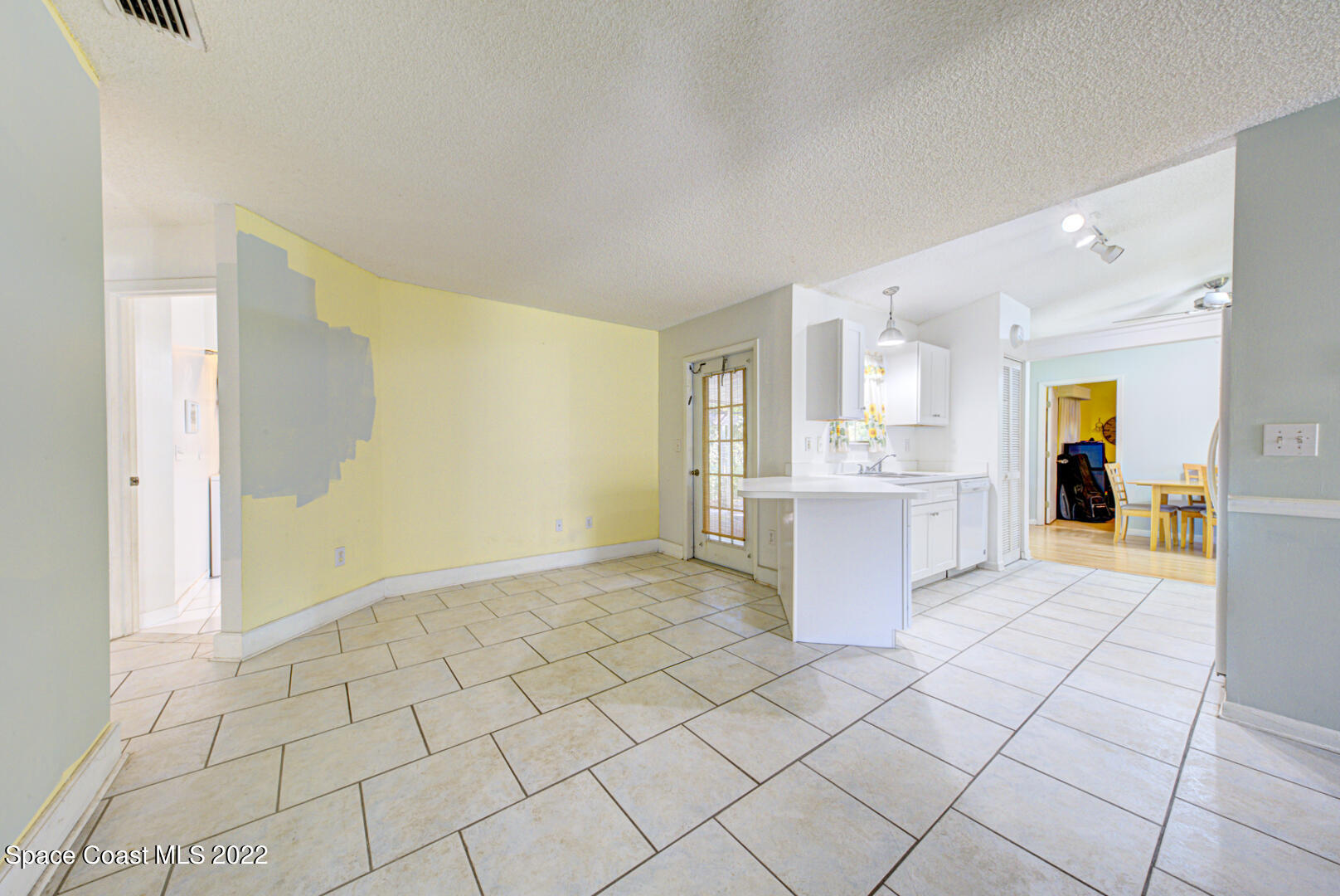 6457 Hunt Road Cocoa, FL 32927 - Photo 19 of 36 family room & kitchen