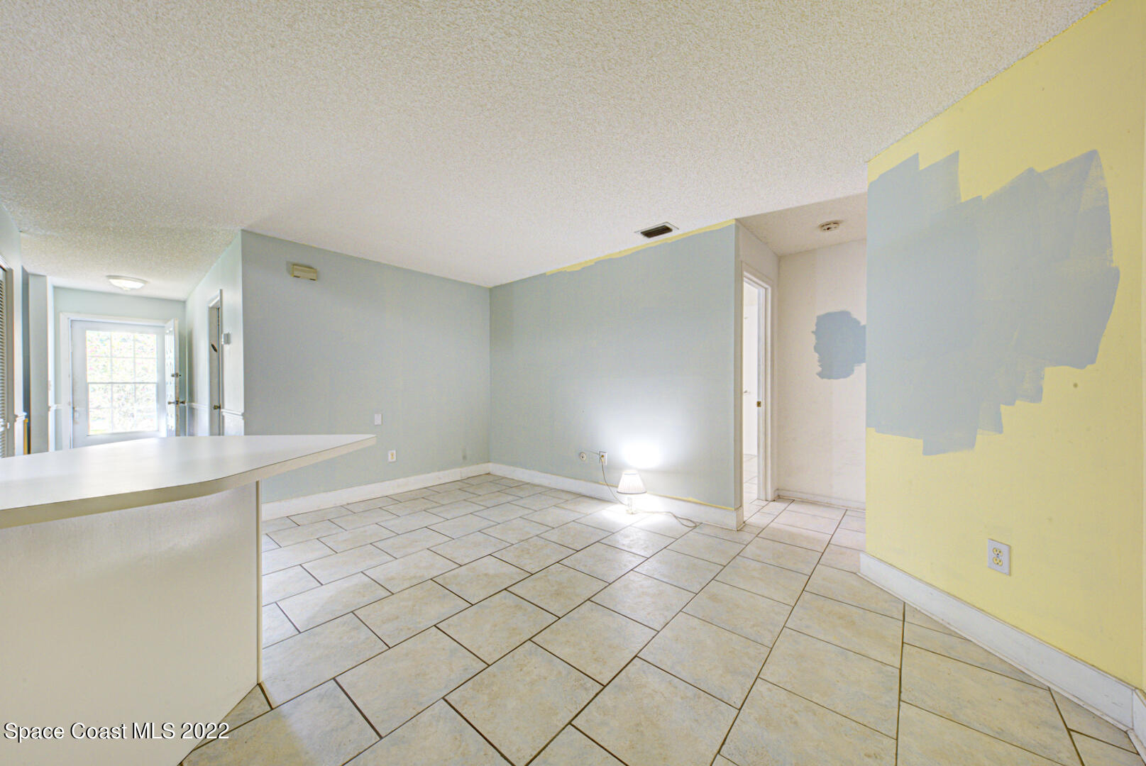 6457 Hunt Road Cocoa, FL 32927 - Photo 20 of 36 family room with tile floor