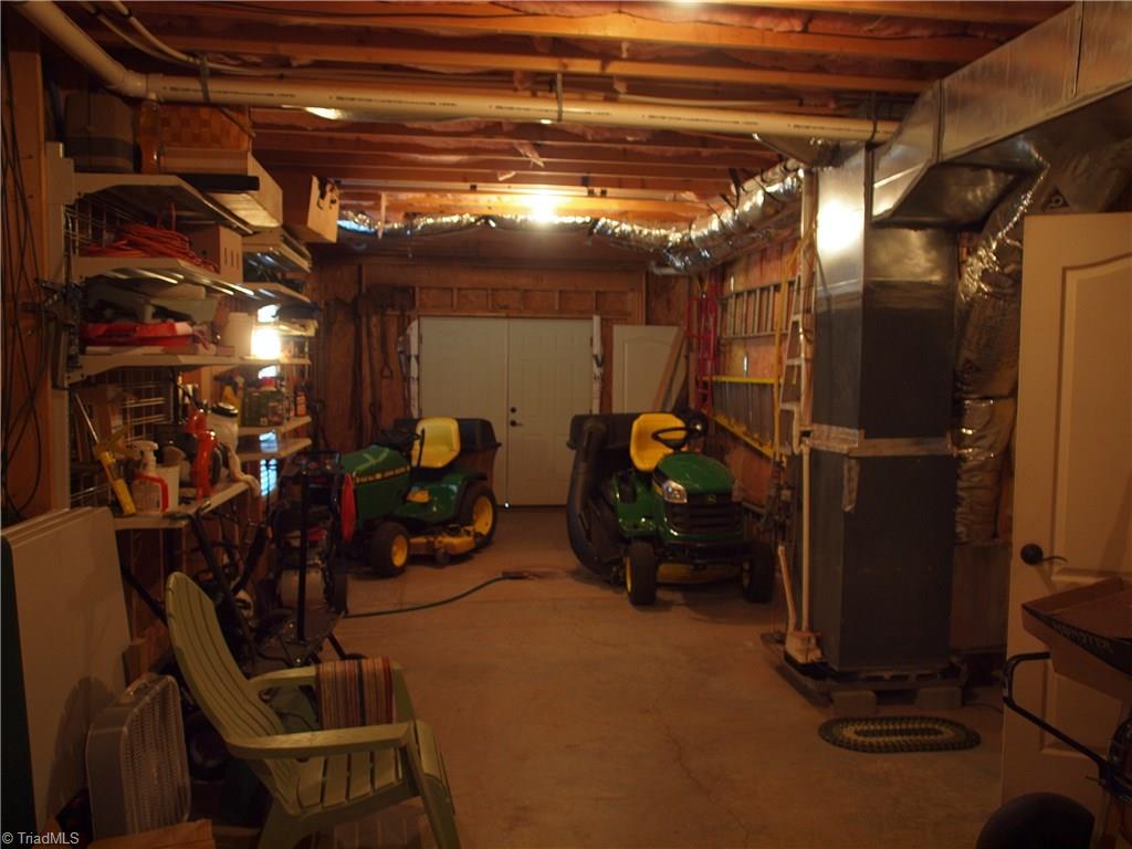 8413 Monticello Ridge Drive Rural Hall, NC 27045 - Photo 14 of 30 storage area beside finished basement area