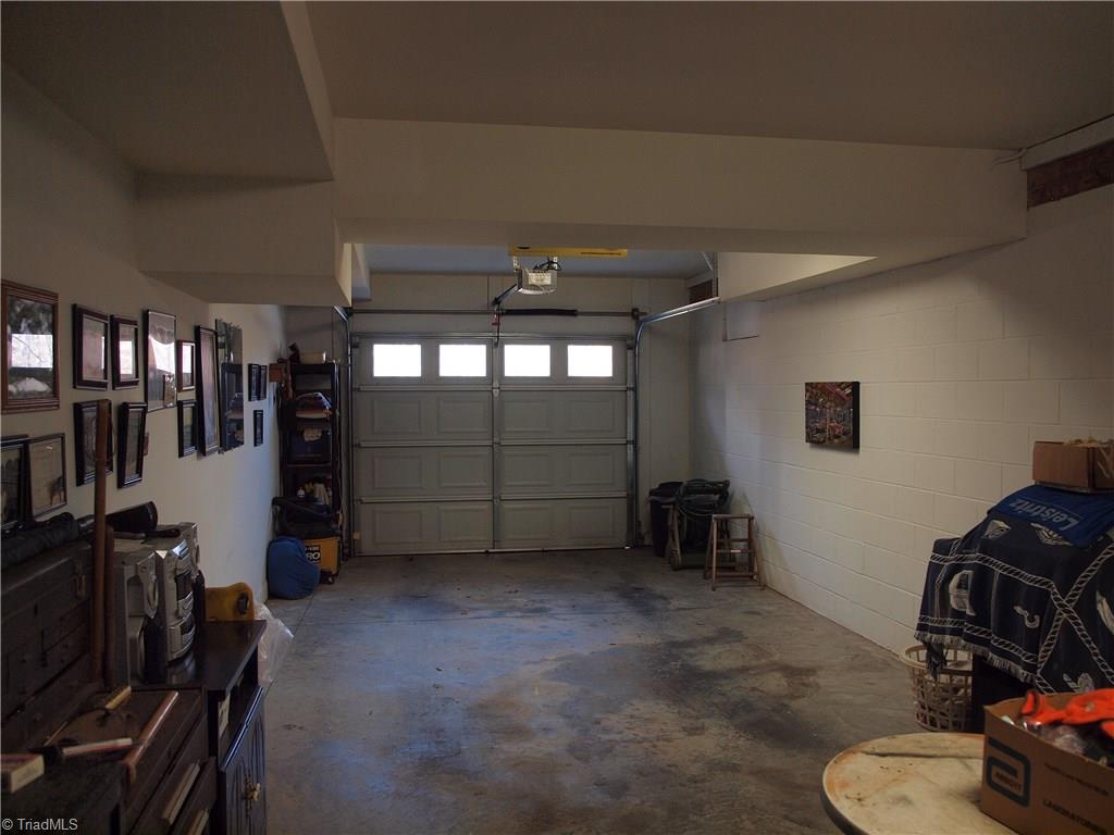 8413 Monticello Ridge Drive Rural Hall, NC 27045 - Photo 15 of 30 single garage bay in back of house. not pictured is workbench area