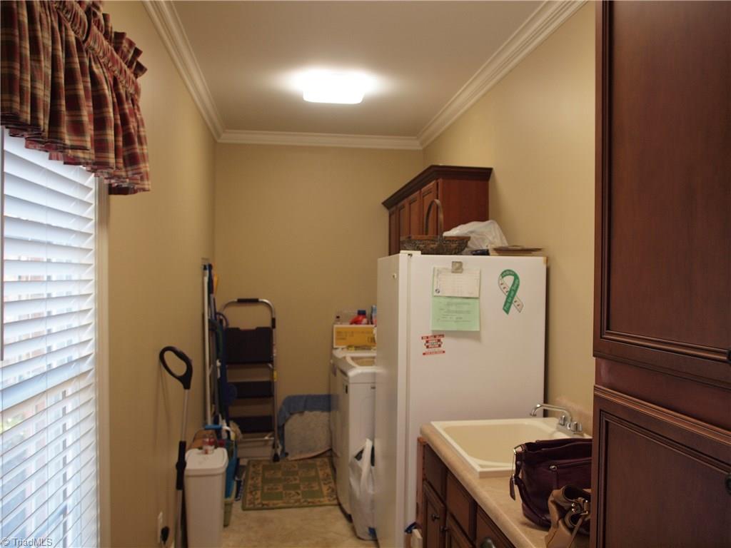 8413 Monticello Ridge Drive Rural Hall, NC 27045 - Photo 20 of 30 Laundry with extra cabinet space