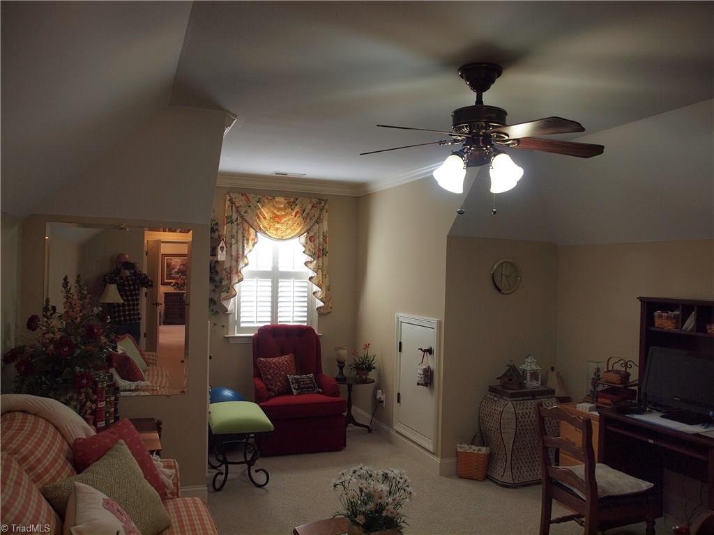 8413 Monticello Ridge Drive Rural Hall, NC 27045 - Photo 21 of 30 second floor bonus room/office. short door opens to floored/lighted storage area