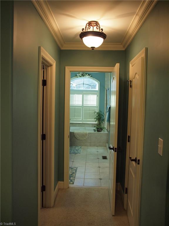 8413 Monticello Ridge Drive Rural Hall, NC 27045 - Photo 6 of 30 Walk-in closet on left, large closet on right. Garden tub pictured