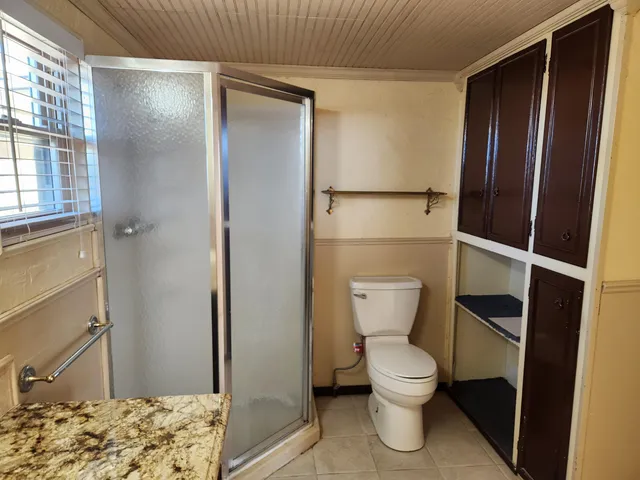 a bathroom with a mirror