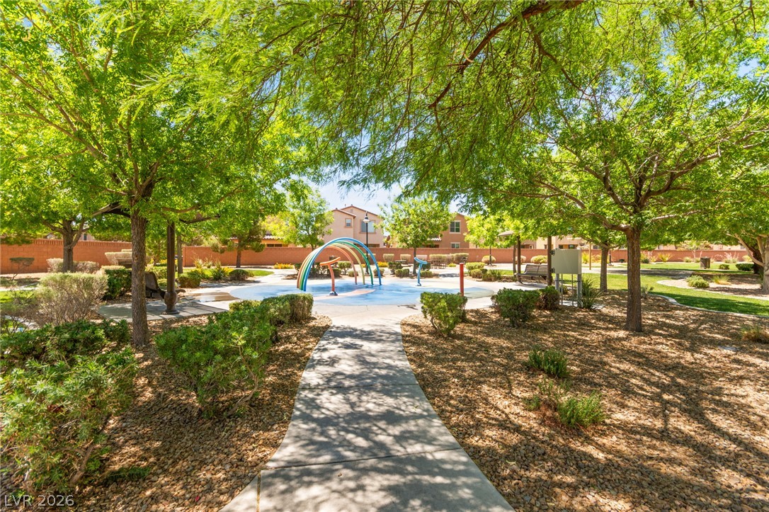 6435 Point Isabel Way Las Vegas, NV 89122 - Photo 51 of 57 A vibrant splash pad anchors this community park, offering a delightful recreational escape.